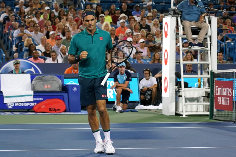 Tennis: Djokovic shakes off rust, Federer rolls in Cincinnati